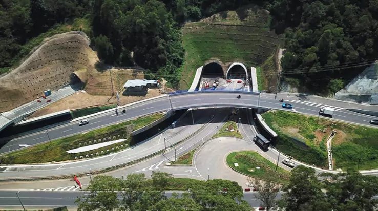 View of a bridge with tunnels that is part of the road infrastructure.